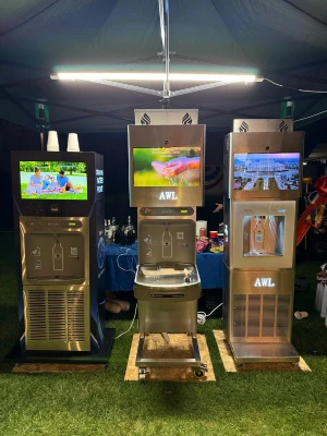 Guests using the AWL dispenser at the US Independence Day reception